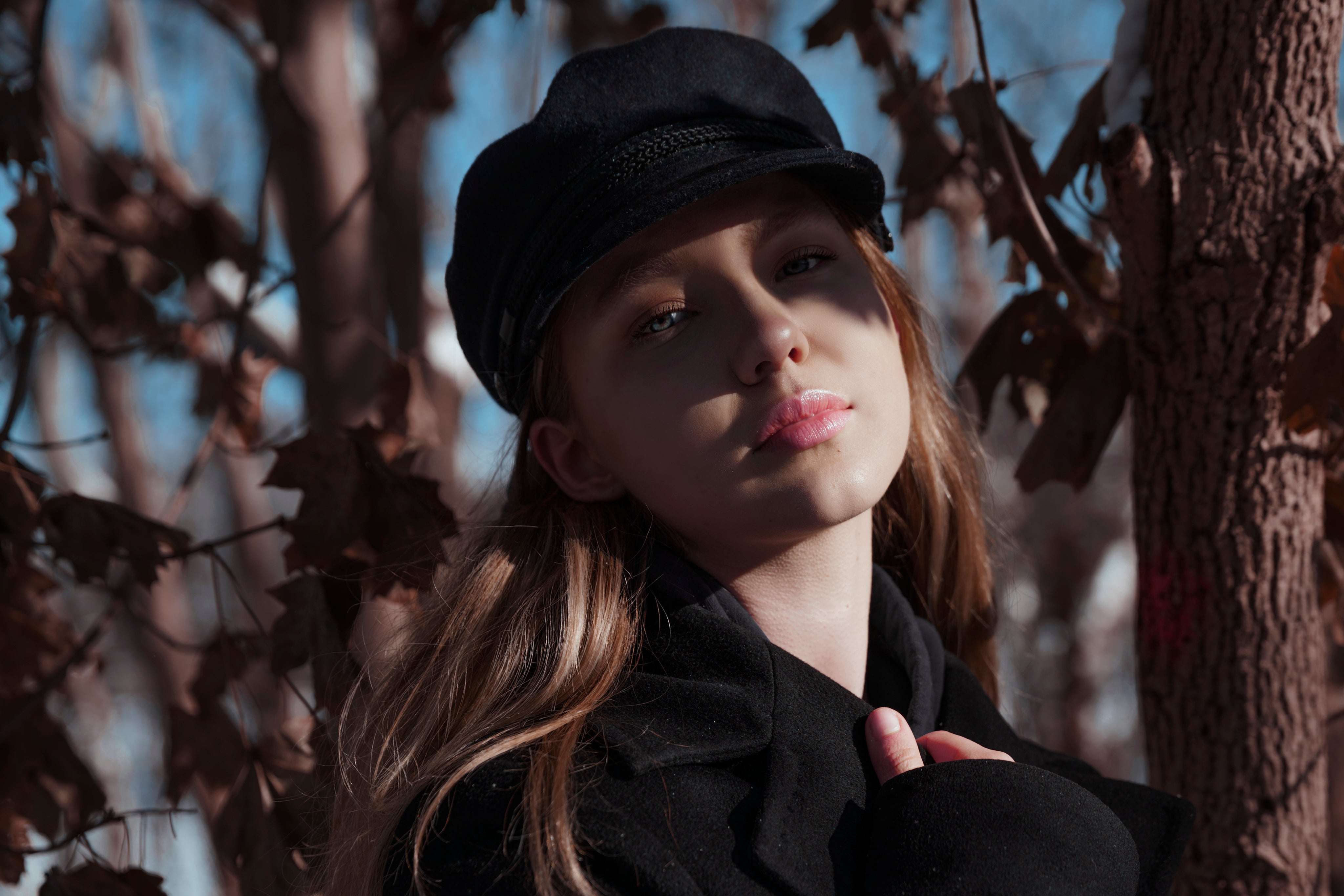 blond-woman-in-black-cap.jpg